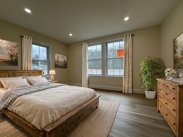 bedroom featuring hardwood / wood-style flooring