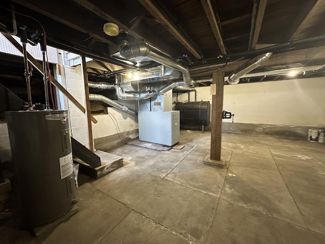 basement with heating unit and water heater