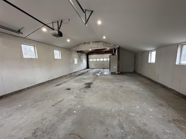 garage with heating unit and a garage door opener