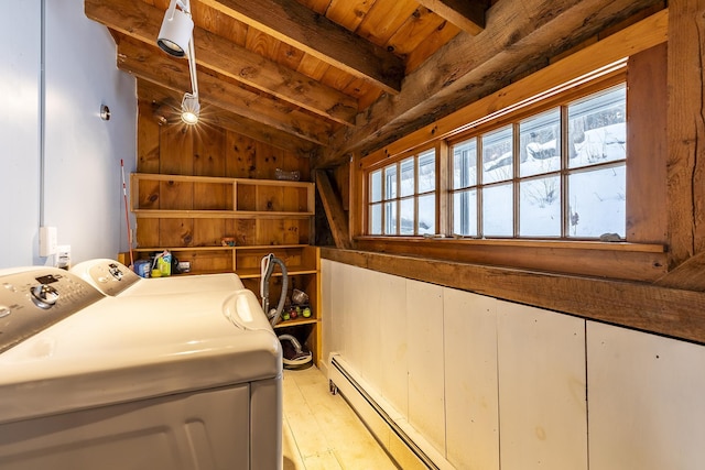 laundry area with wooden ceiling, light hardwood / wood-style floors, wood walls, and separate washer and dryer