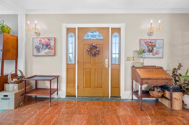 entrance foyer featuring ornamental molding