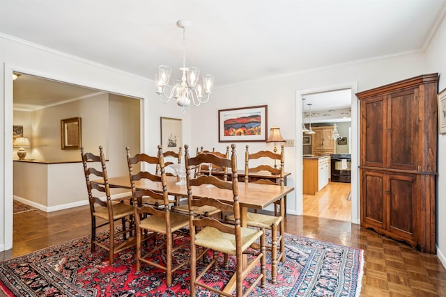 dining space featuring a notable chandelier, parquet floors, and crown molding