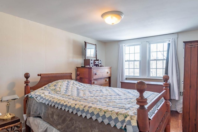 bedroom featuring hardwood / wood-style flooring