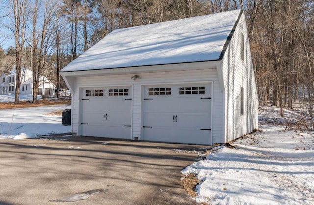 view of snow covered garage