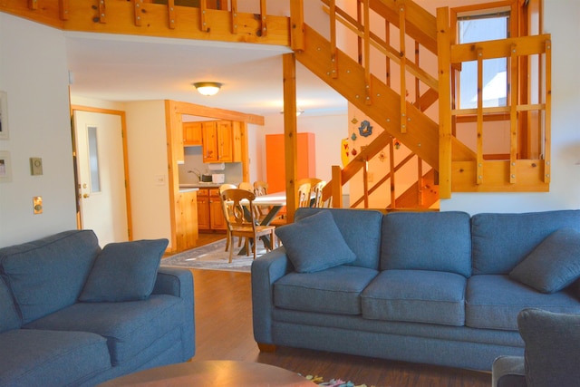 living room with dark hardwood / wood-style floors