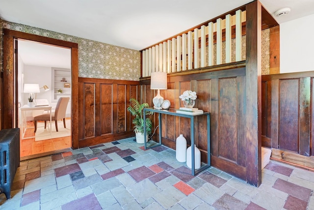 entrance foyer with wooden walls