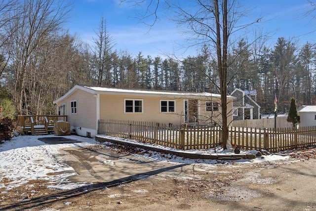 view of front of house with a deck