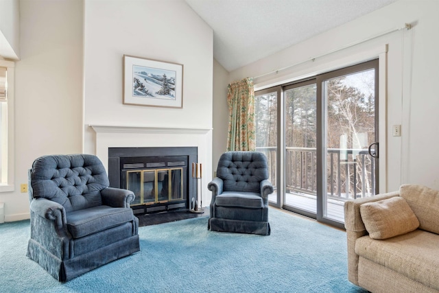 living room featuring carpet and lofted ceiling