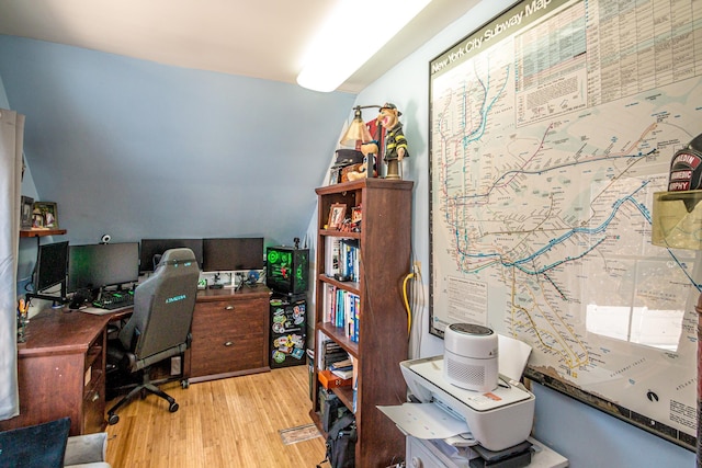 office area with light hardwood / wood-style flooring