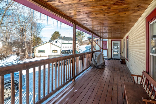 view of snow covered deck