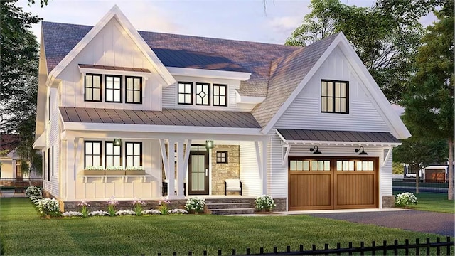 modern inspired farmhouse featuring a garage, a lawn, a standing seam roof, a porch, and board and batten siding