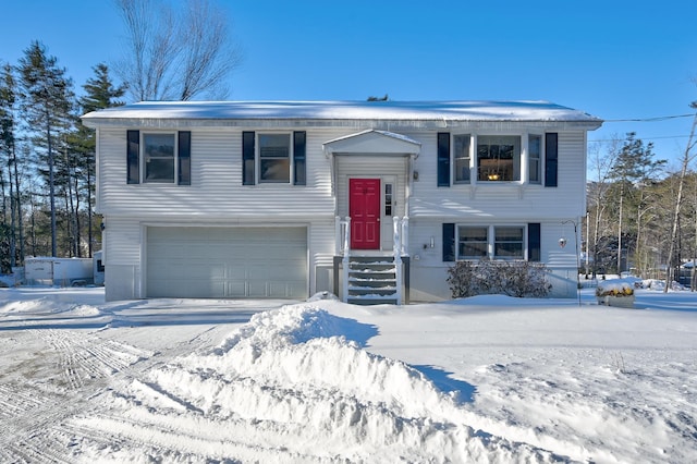 bi-level home featuring a garage