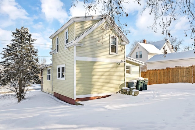 view of snow covered property