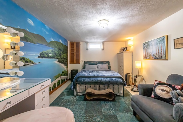 bedroom with dark carpet and a textured ceiling