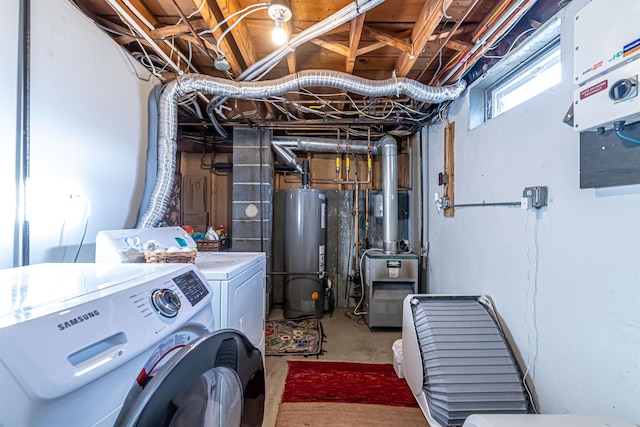 laundry area with washer and dryer and gas water heater