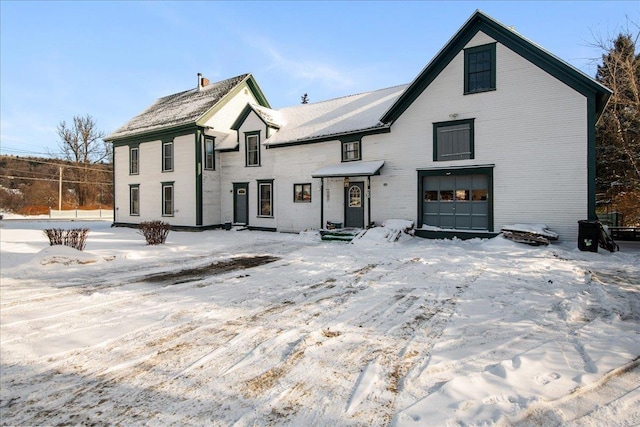 front of property with a garage