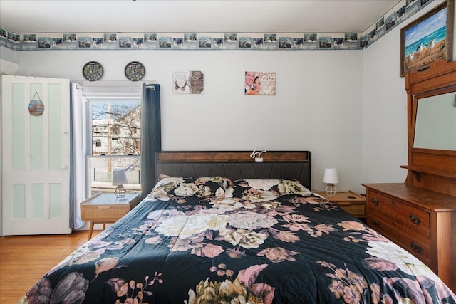 bedroom with light wood-type flooring