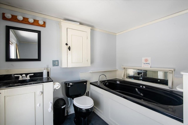 bathroom featuring ornamental molding and vanity