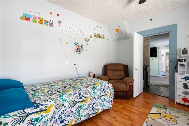 bedroom featuring ceiling fan and wood-type flooring