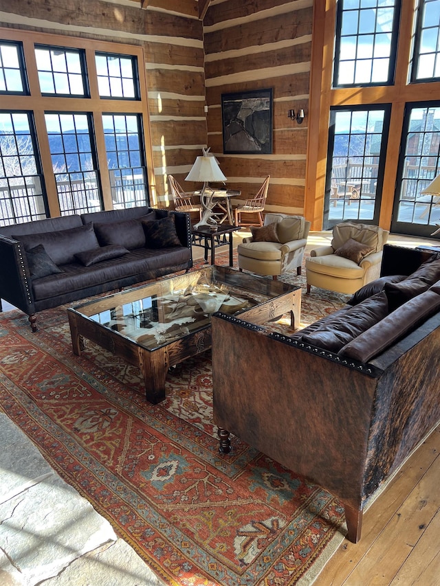 living room with wood walls