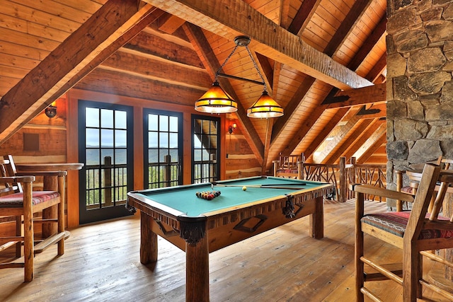 playroom featuring a water view, light hardwood / wood-style flooring, lofted ceiling with beams, and wooden ceiling