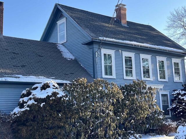 view of snow covered property