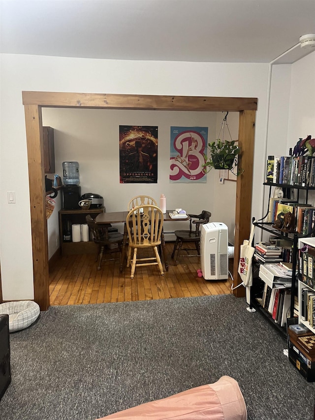 dining area with hardwood / wood-style floors