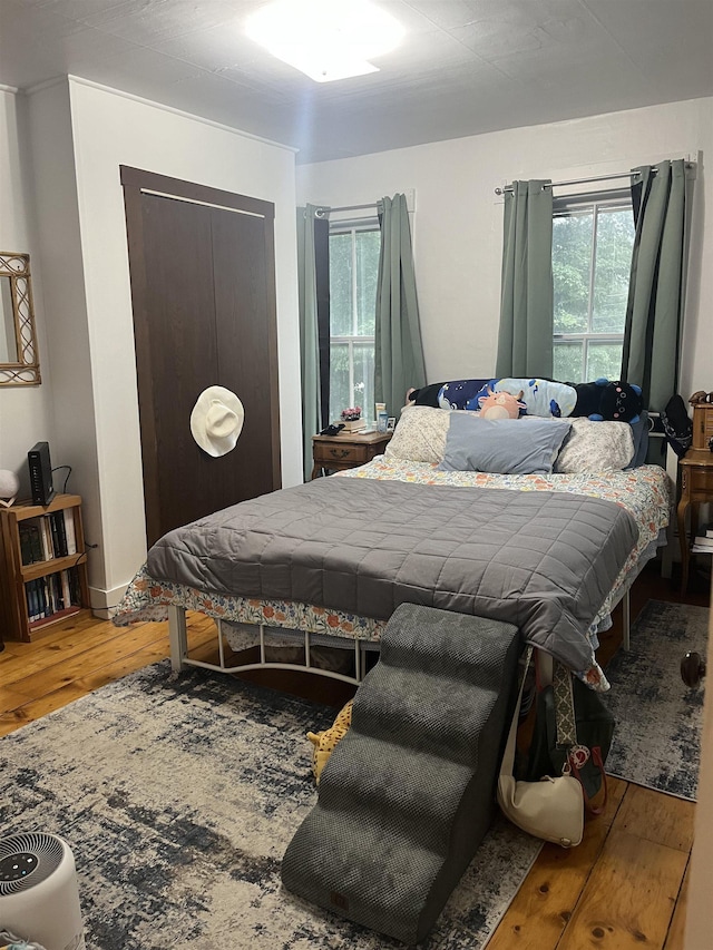 bedroom featuring hardwood / wood-style floors