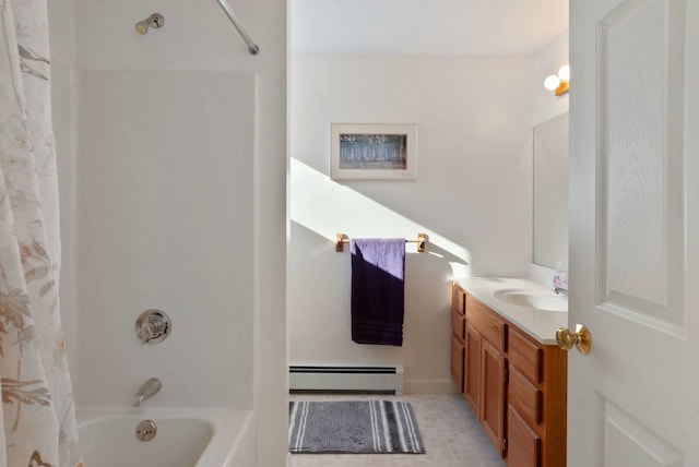 bathroom with vanity, a baseboard heating unit, and shower / bath combination with curtain