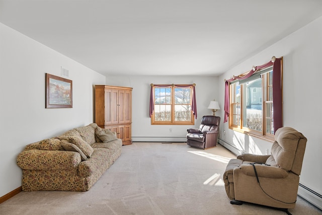 carpeted living room featuring baseboard heating