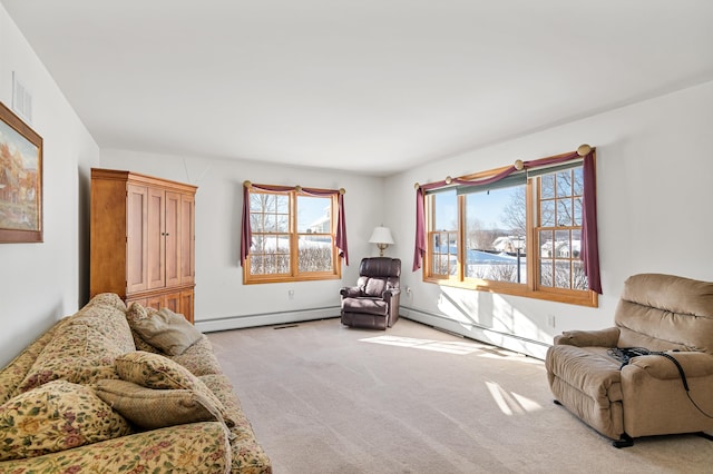 living room with light colored carpet and baseboard heating