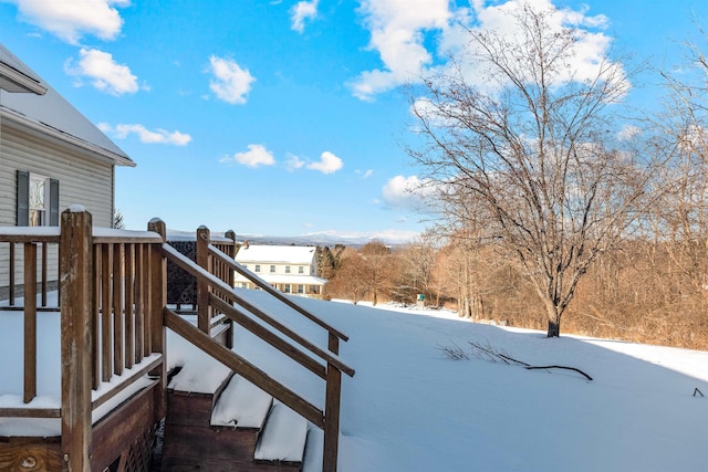 view of yard covered in snow