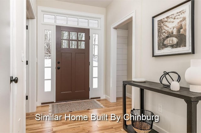 foyer entrance featuring light wood-type flooring