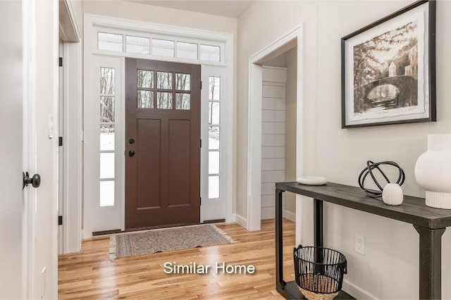 foyer entrance featuring light hardwood / wood-style flooring