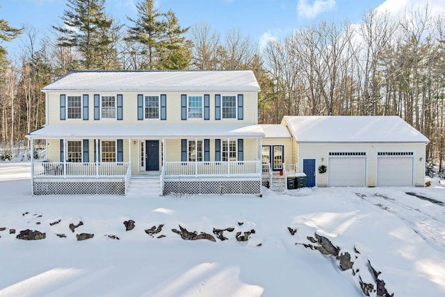 view of front of property with a porch and a garage