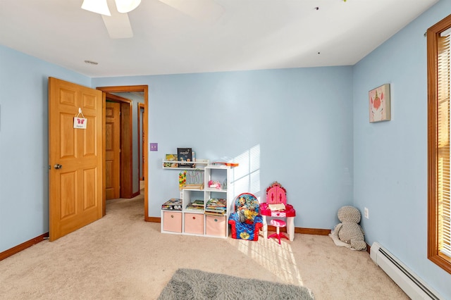 game room with light colored carpet and baseboard heating