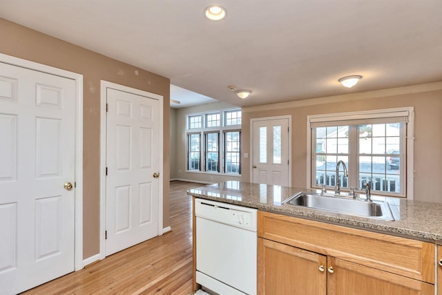 kitchen with sink, light hardwood / wood-style flooring, dishwasher, and crown molding