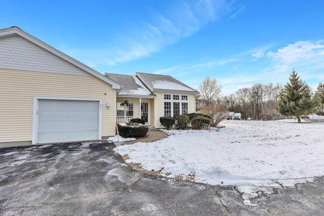 single story home featuring a garage