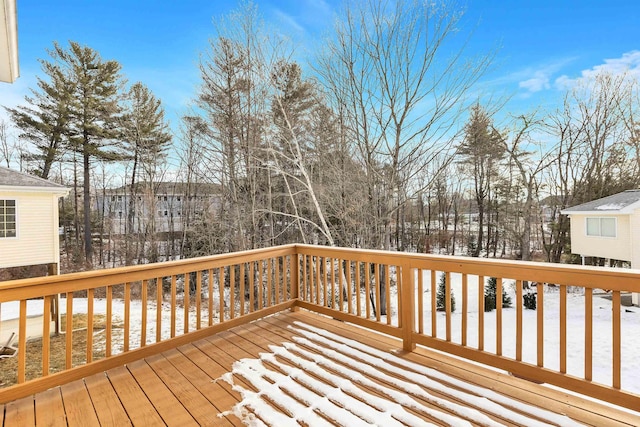 view of snow covered deck