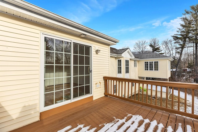 view of snow covered deck