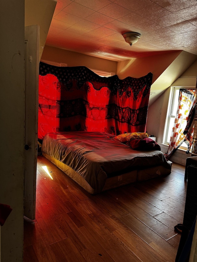 bedroom featuring hardwood / wood-style floors