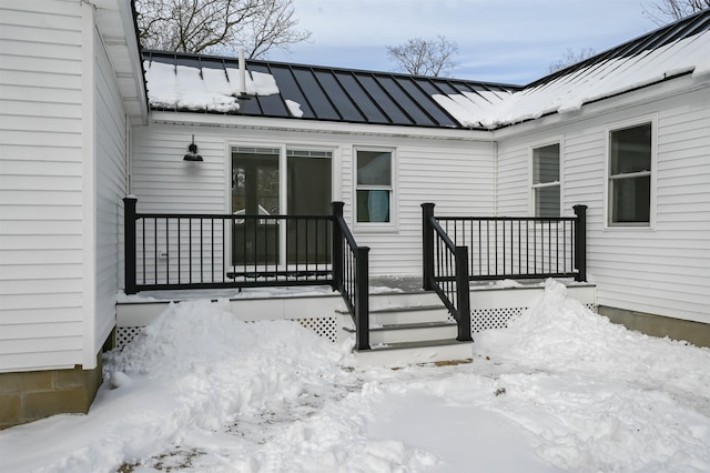 view of snow covered deck