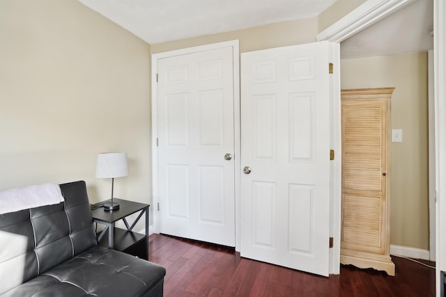 living area featuring dark hardwood / wood-style flooring