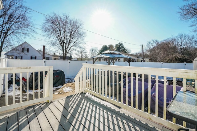 wooden deck featuring a gazebo