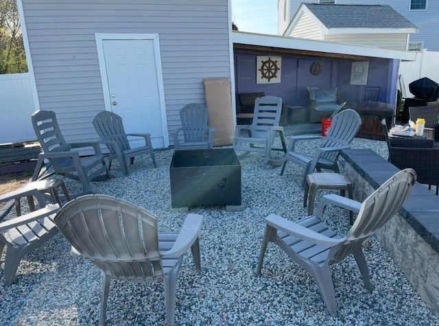 view of patio featuring an outdoor fire pit