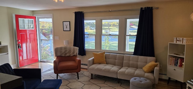 living room featuring a baseboard heating unit