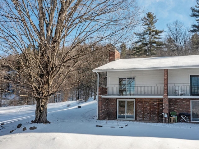 view of yard covered in snow