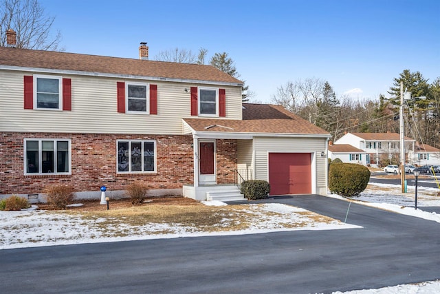 view of front property with a garage