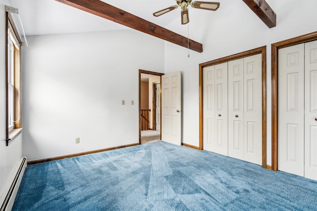 unfurnished bedroom with a baseboard radiator, carpet floors, two closets, ceiling fan, and lofted ceiling with beams