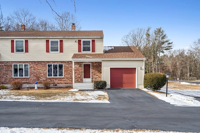 view of front property with a garage